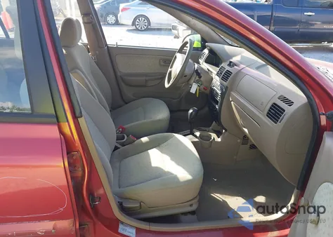 2003 Kia Rio Cinco z USA, uszkodzony, nr VIN KNADC165236128403